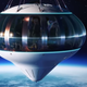 A render of the Space Perspective capsule floating above the earth.